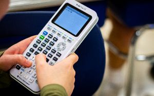 Student using a calculator